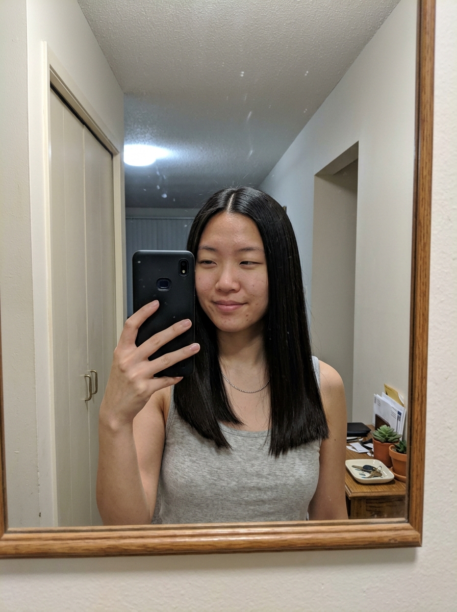 Short Hair Style Short black hair with clean tone balance for natural-light color checking.